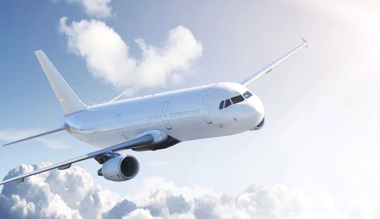 airplane-in-the-clouds-9862.jpg