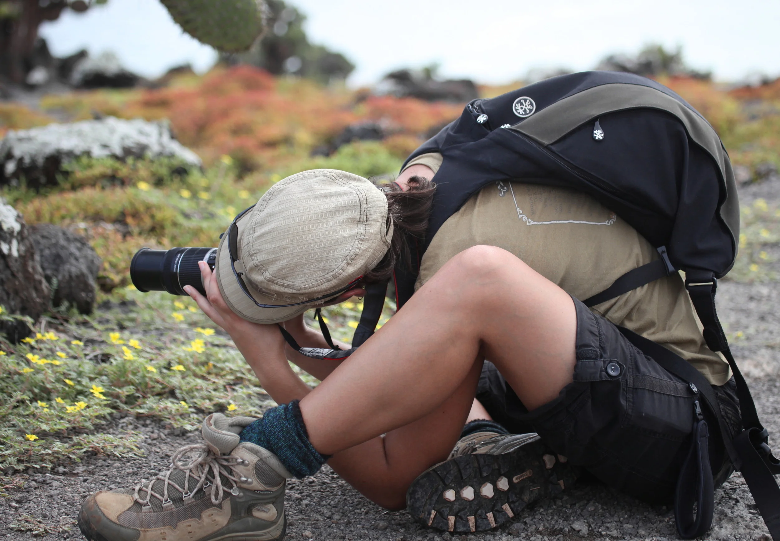 Awkward postures are sometimes required for that perfect shot