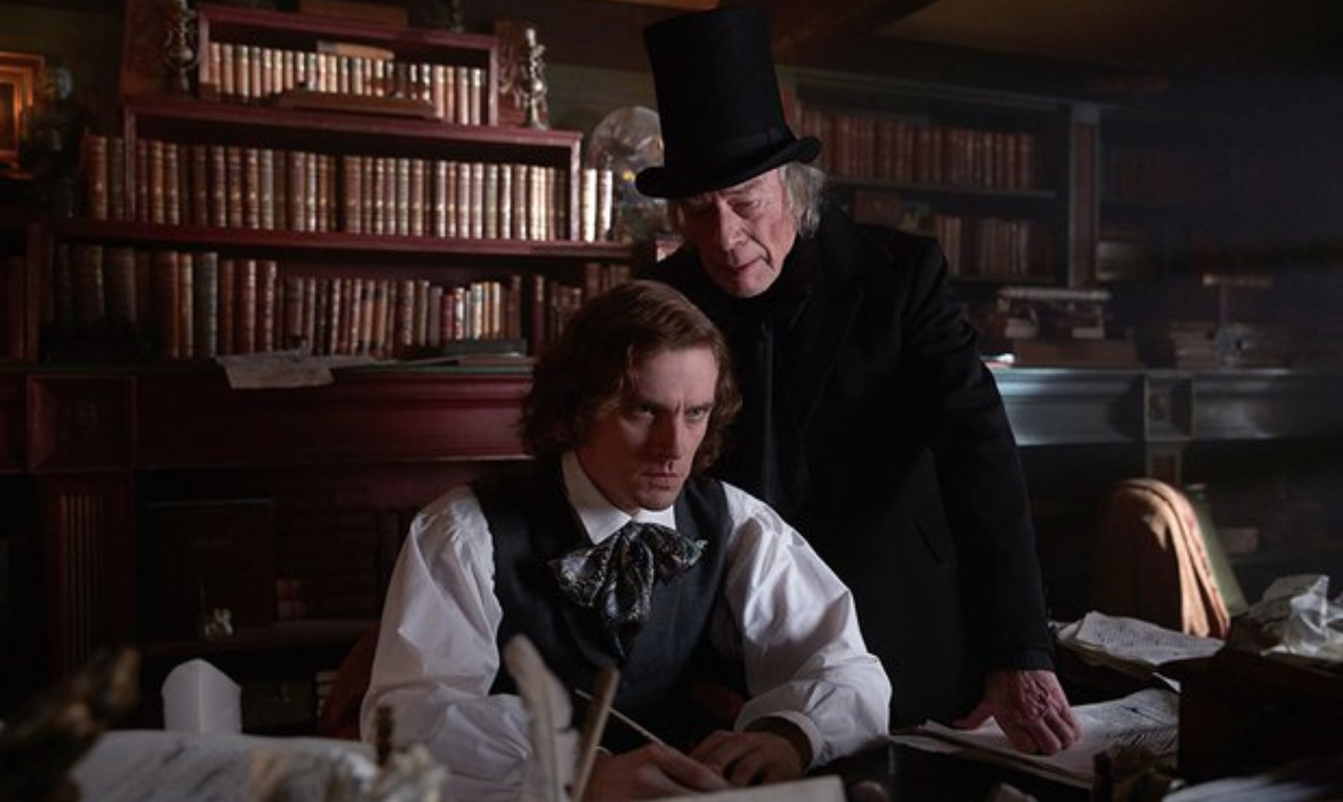 Dan Stevens and Christopher Plummer in The Man Who Invented Christmas