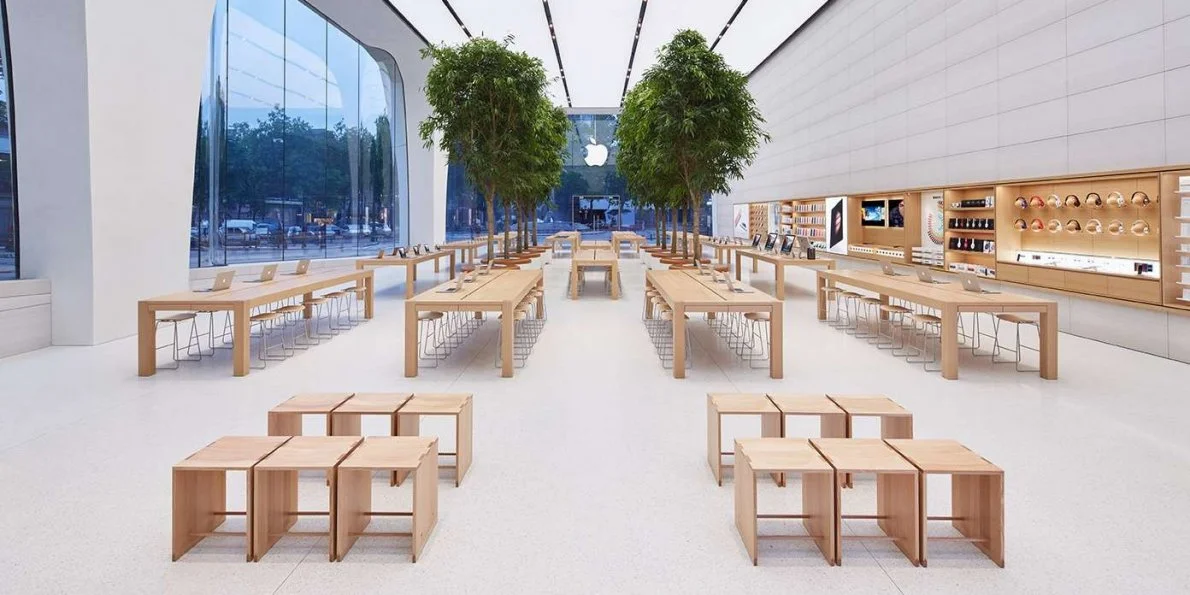 If this were a Amazon Store.... The tables would be like individual stalls for each business. And, the wall on the right where Apple sells accessories and 3rd party products, could be a place to sell Amazon products. (I'm convincing a designer to do a mock-up for an Amazon store, but until then please ignore the Apple logo up there ;P)