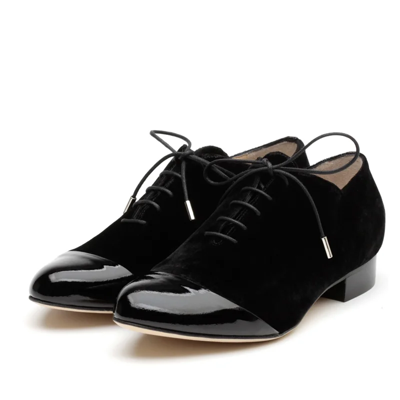 Black velvet lace up flats pair