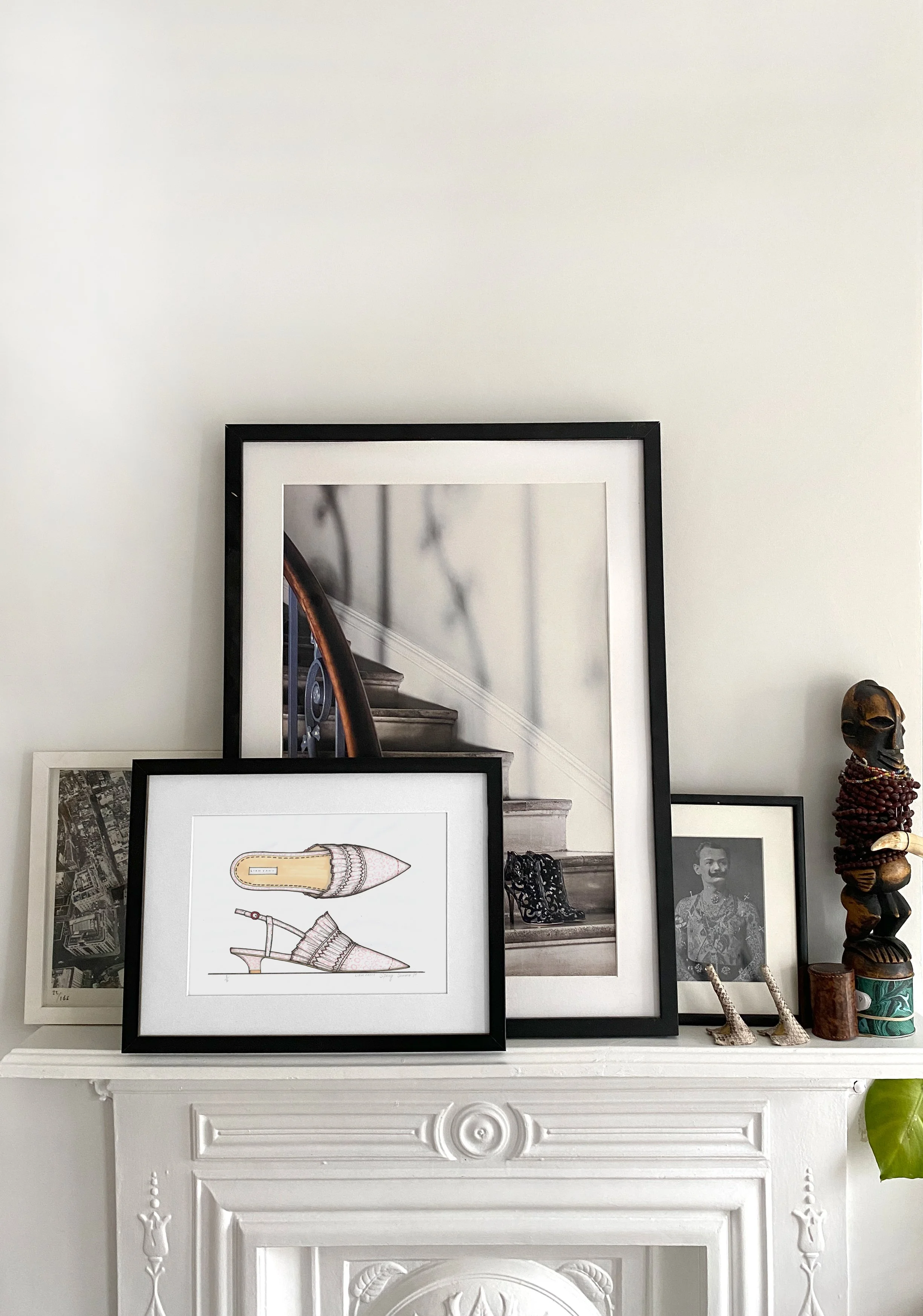 picture of hand illustrated kitten heel on wall