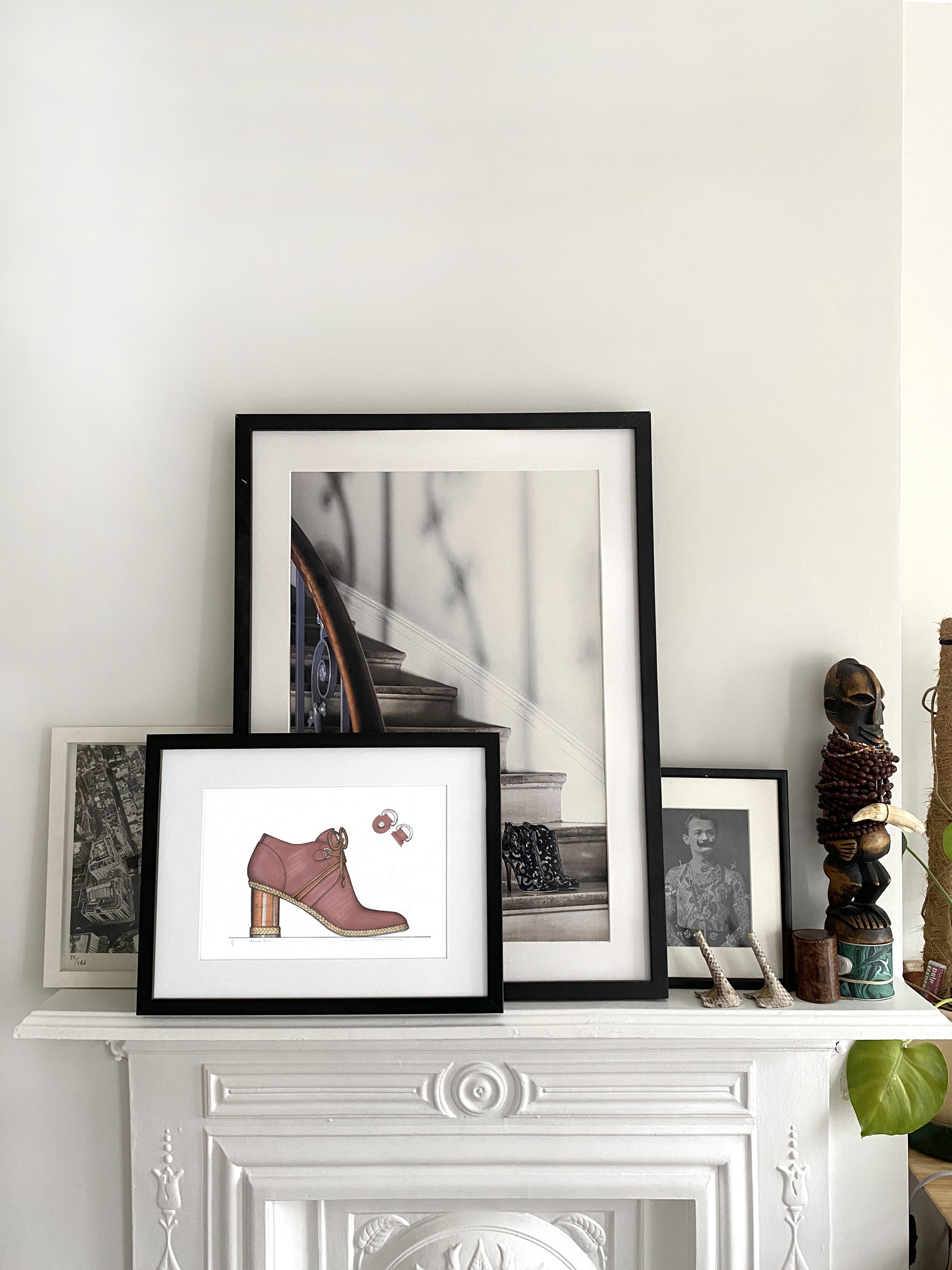 Limited edition illustration of burgundy ankle boot with wooden heel on a shelf