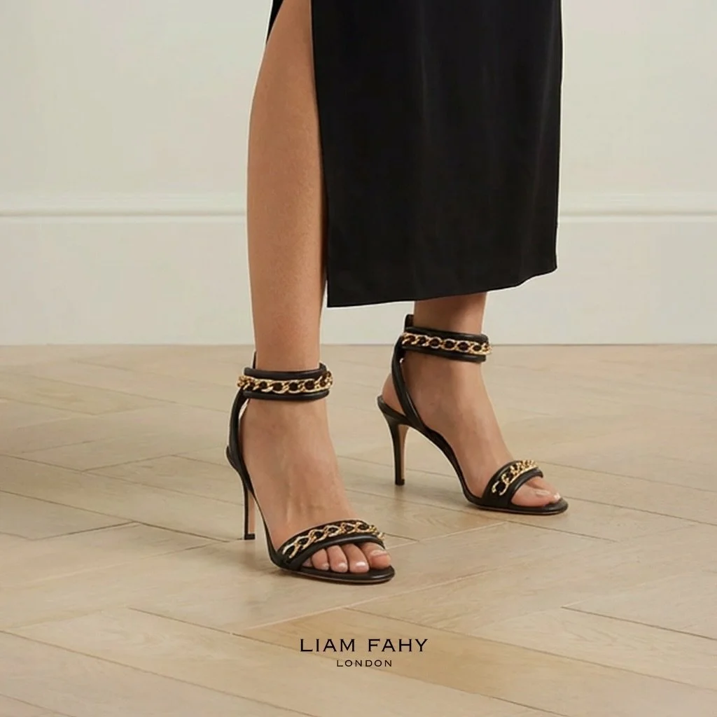 It&rsquo;s Glamuary month! 30 days of looking good and no sh!t shoes.
Who&rsquo;s in? 
#glamuary 
.
.
.
.
.
.
- Black padded nappy leather straps with gold engraved flat chain. 45mm Louie heel with nabuk cuoio sole.
.- Black bracelet with gold flat c