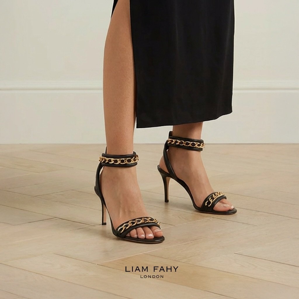 It&rsquo;s Glamuary month! 30 days of looking good and no sh!t shoes.
Who&rsquo;s in? 
#glamuary 
.
.
.
.
.
.
- Black padded nappy leather straps with gold engraved flat chain. 45mm Louie heel with nabuk cuoio sole.
.- Black bracelet with gold flat c