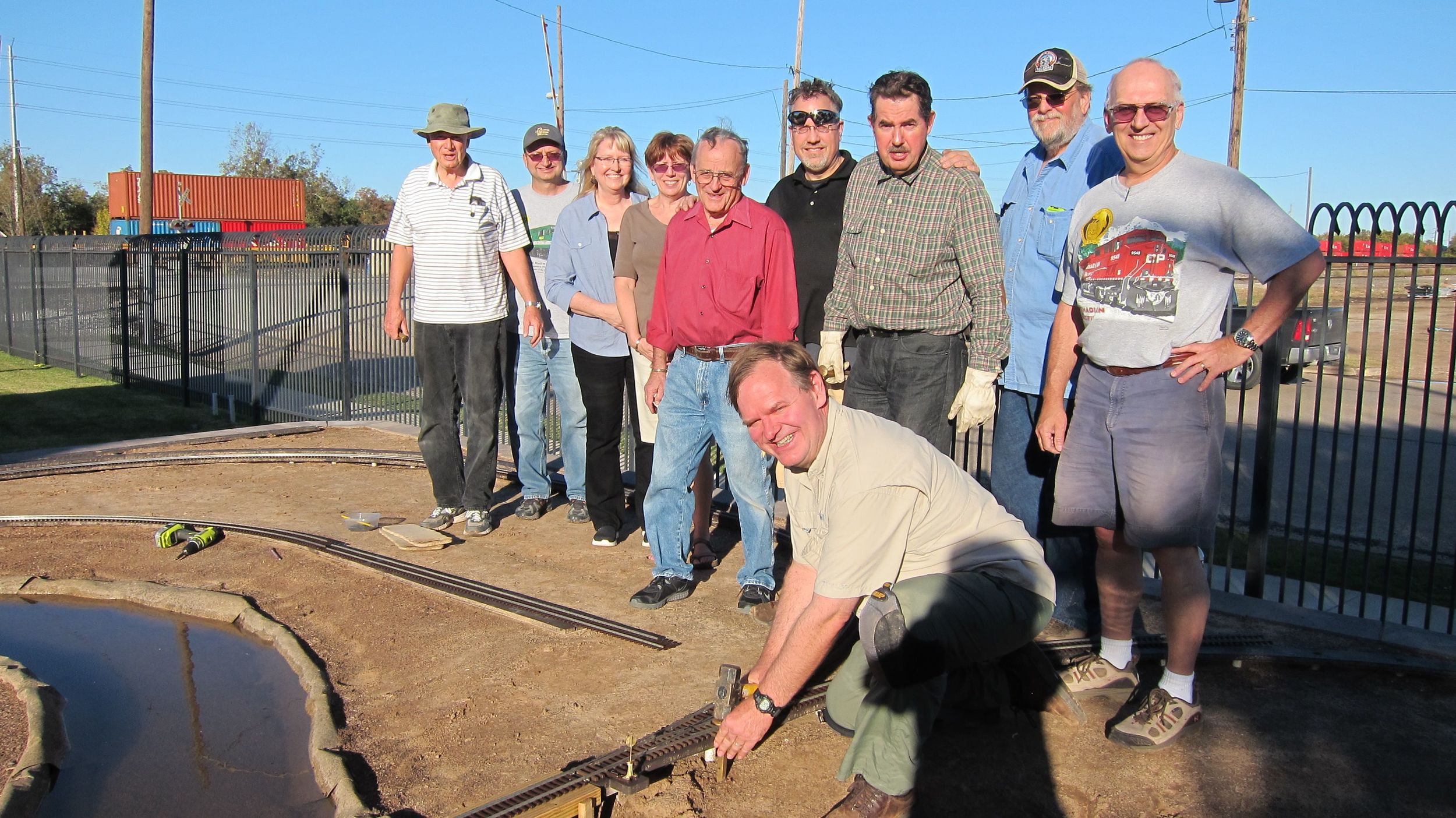 Greg Cauthen, president of the RMM Board and HAGG member, drives the Golden Spike. Joined by other HAGG members and RRM board members.