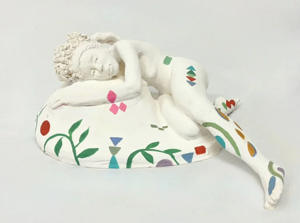 WOMAN AT REST