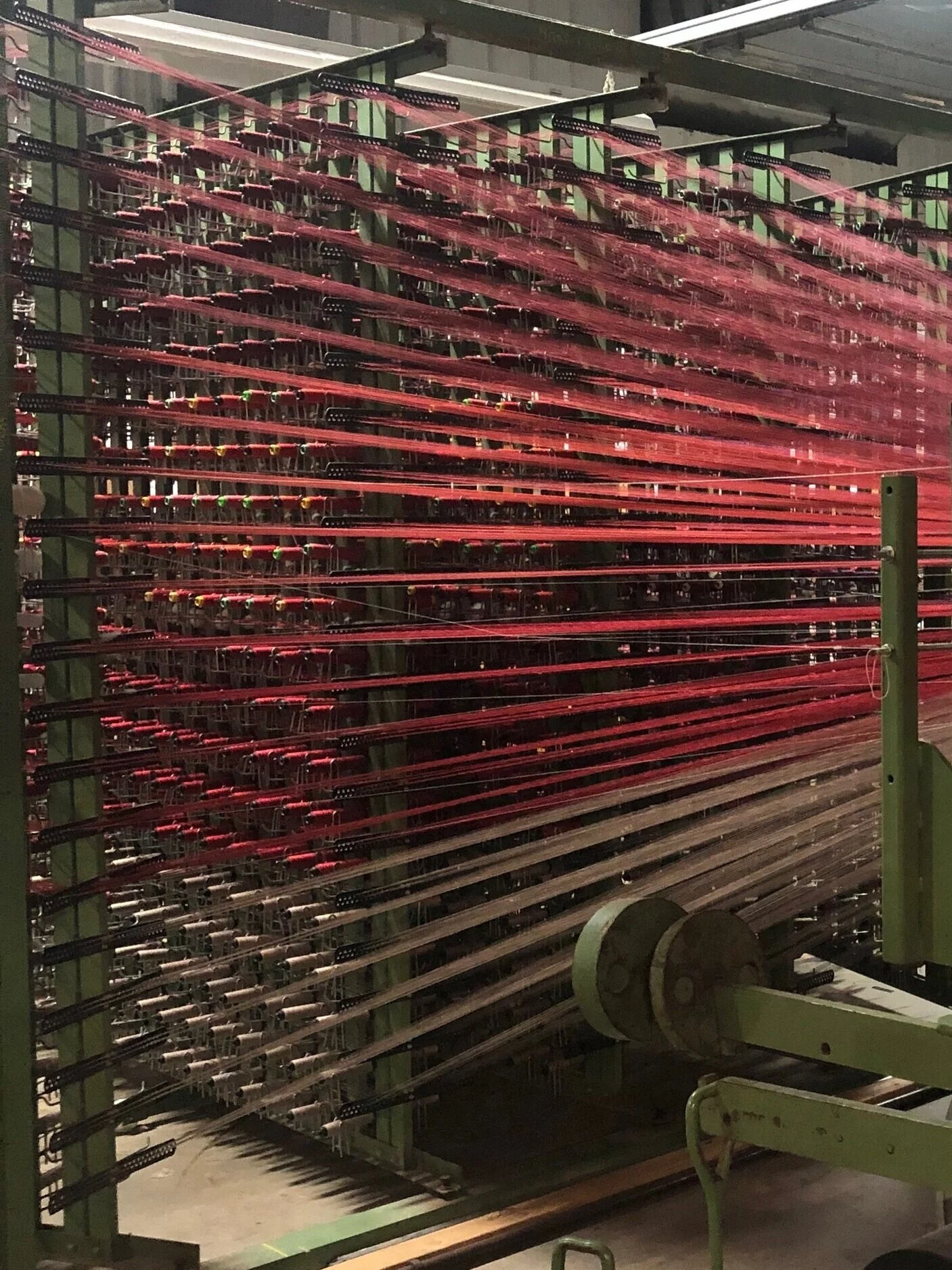 OVERDYED Jacquard Velvets, 2019. Linen, rayon, and cotton pile on a cotton/polyester base. A piece from a group of cut and loop velvet explorations meant to mimic the look of overdyed carpets. They use custom, planted bobbin layouts (shown here), multiple yarn types, and three mixing frames to create richly varied but subtle surfaces that read as solids from afar. The organic variations in color contrast with precise carved out linework. New weaves were explored to achieve three distinct pile heights. Woven for Material Technology and Logistics.