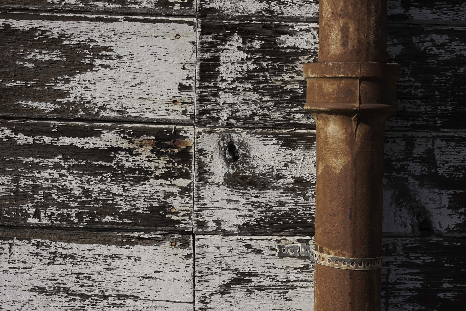 rustic wall with rusty pipe.jpg
