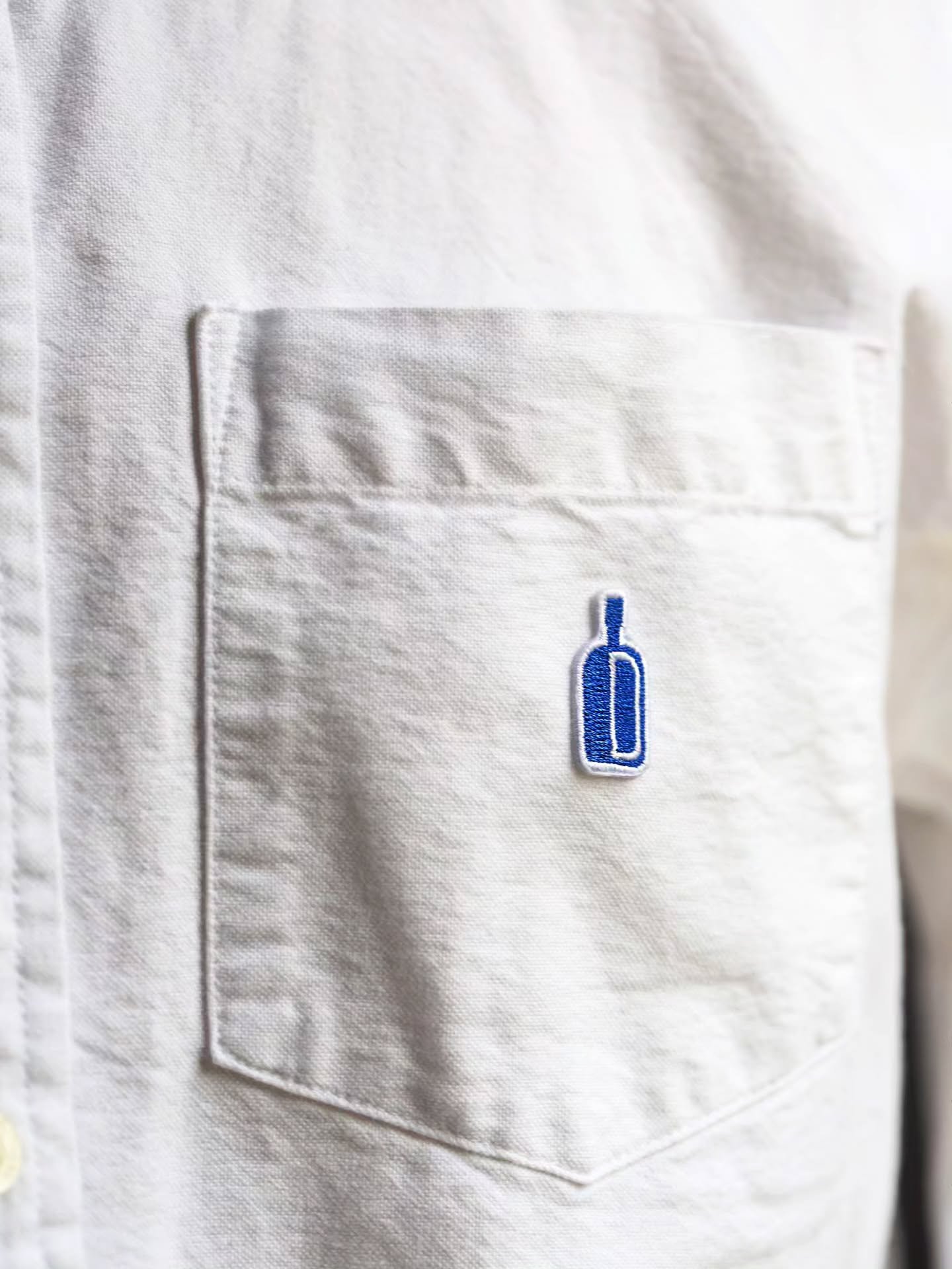 90 Proof Button Down Oxfords. Available in white and blue.