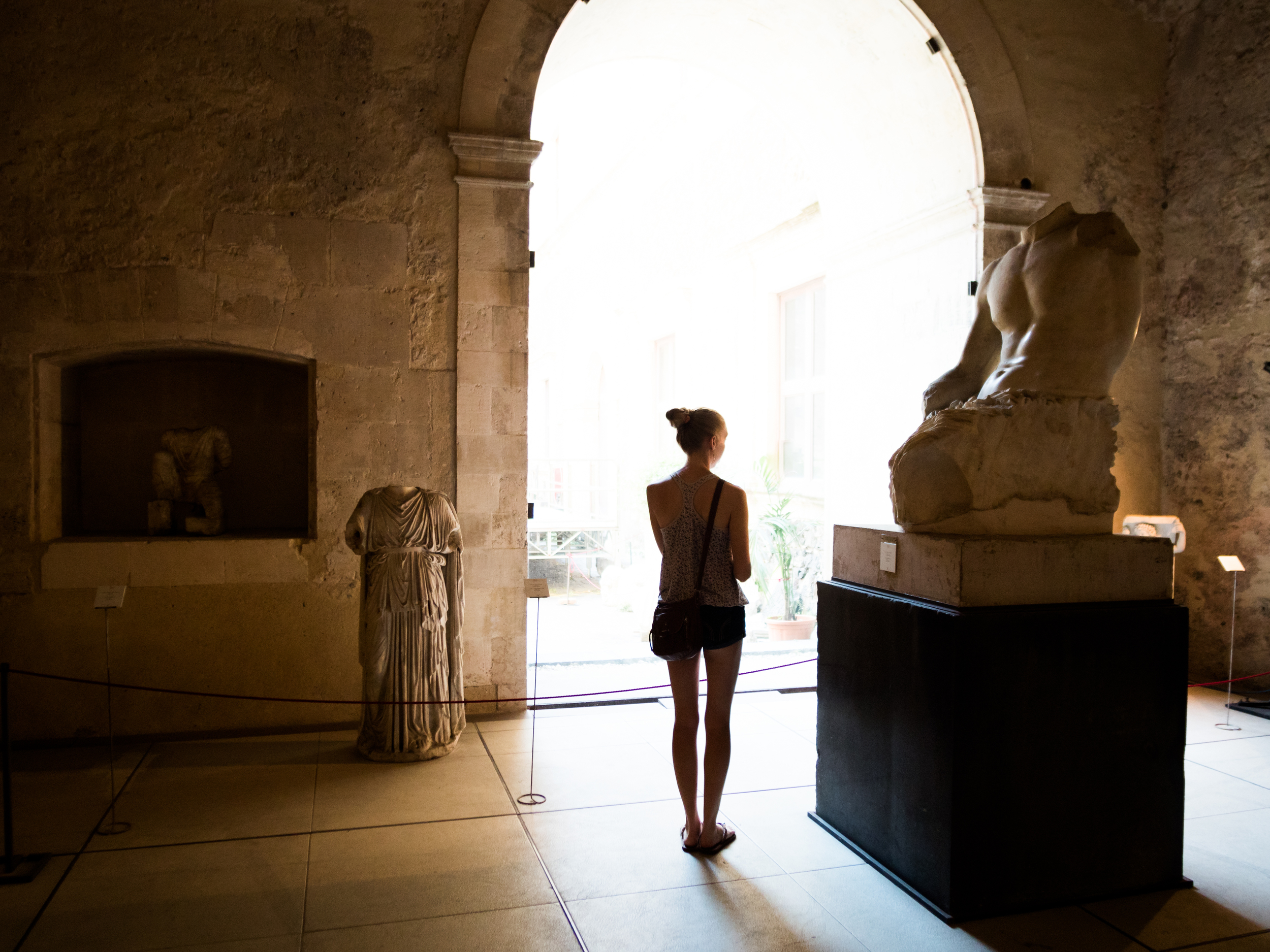 This happened to turn out as a nice photo of Alexis looking at some of the art in the castle.