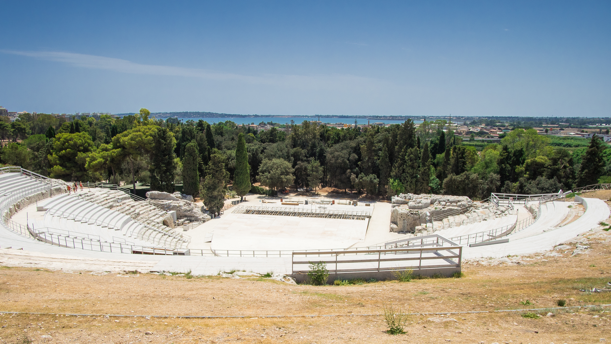 The Greeks did know how to build a theater with a view as this one has a view of the island and Bay Area like in Taormina there is a view of Mt Etna.