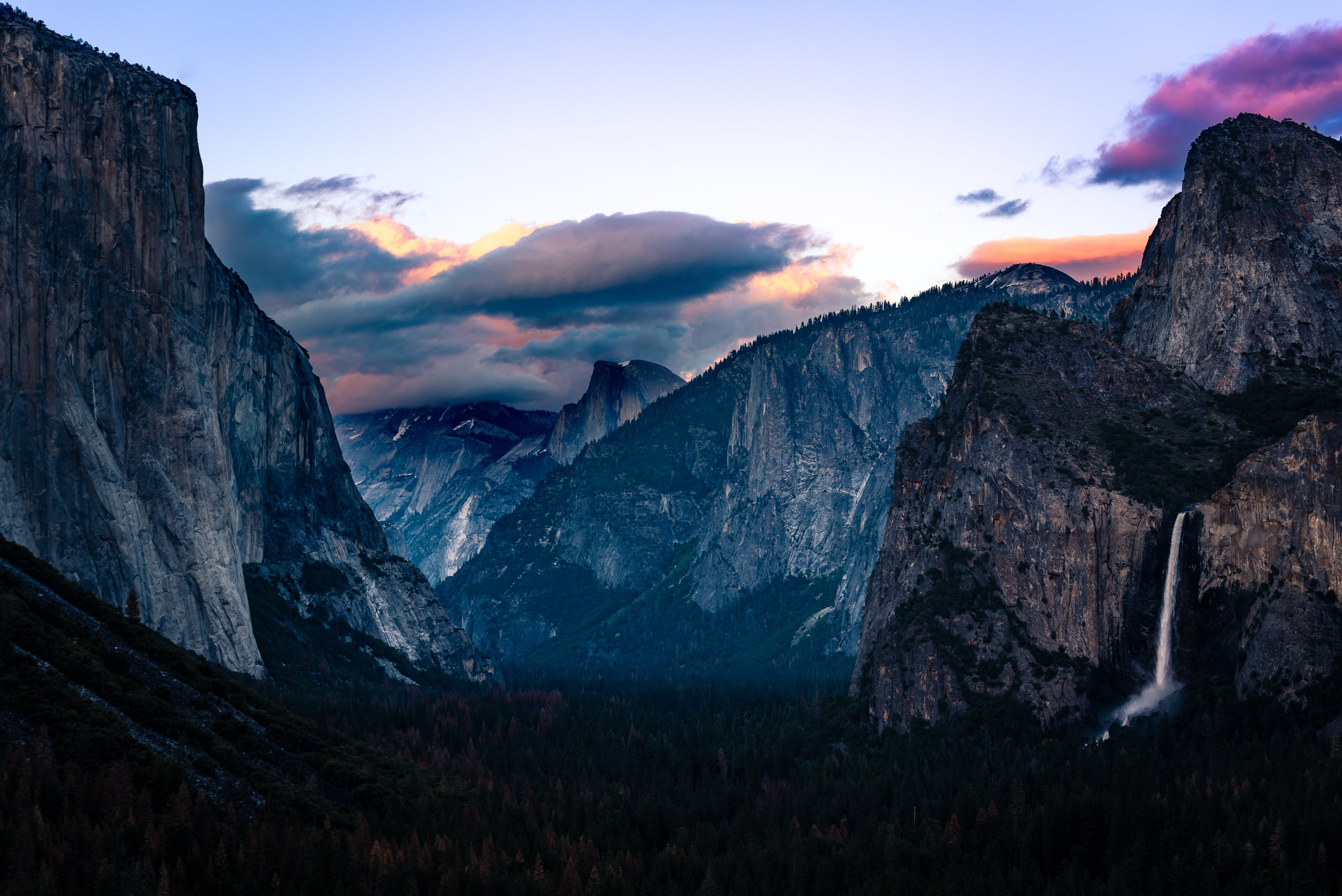 Tunnel View made popular by Ansel Adams has a large parking lot and viewpoint. Thousands of people shoot this spot annually.