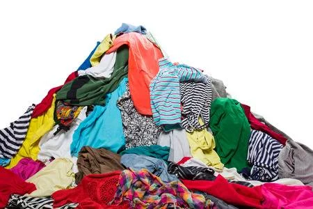 26775118-big-heap-of-colorful-clothes-isolated-on-white.jpg