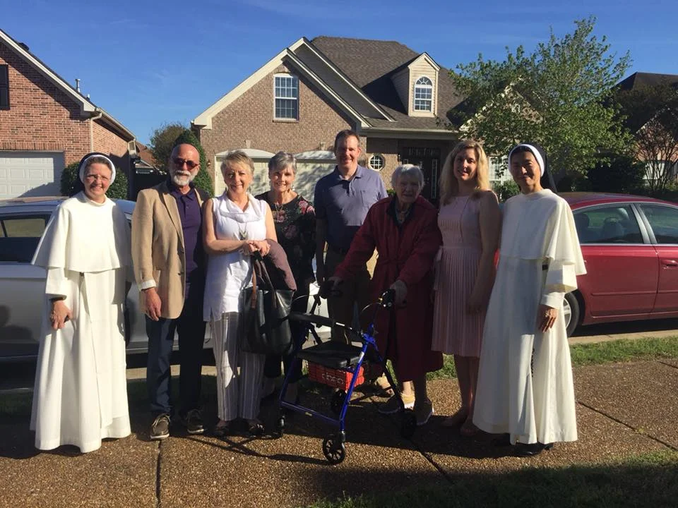 MB and I with our Easter dinner guests. The new-in-town guest did not want to be in the picture, so she took the photo.