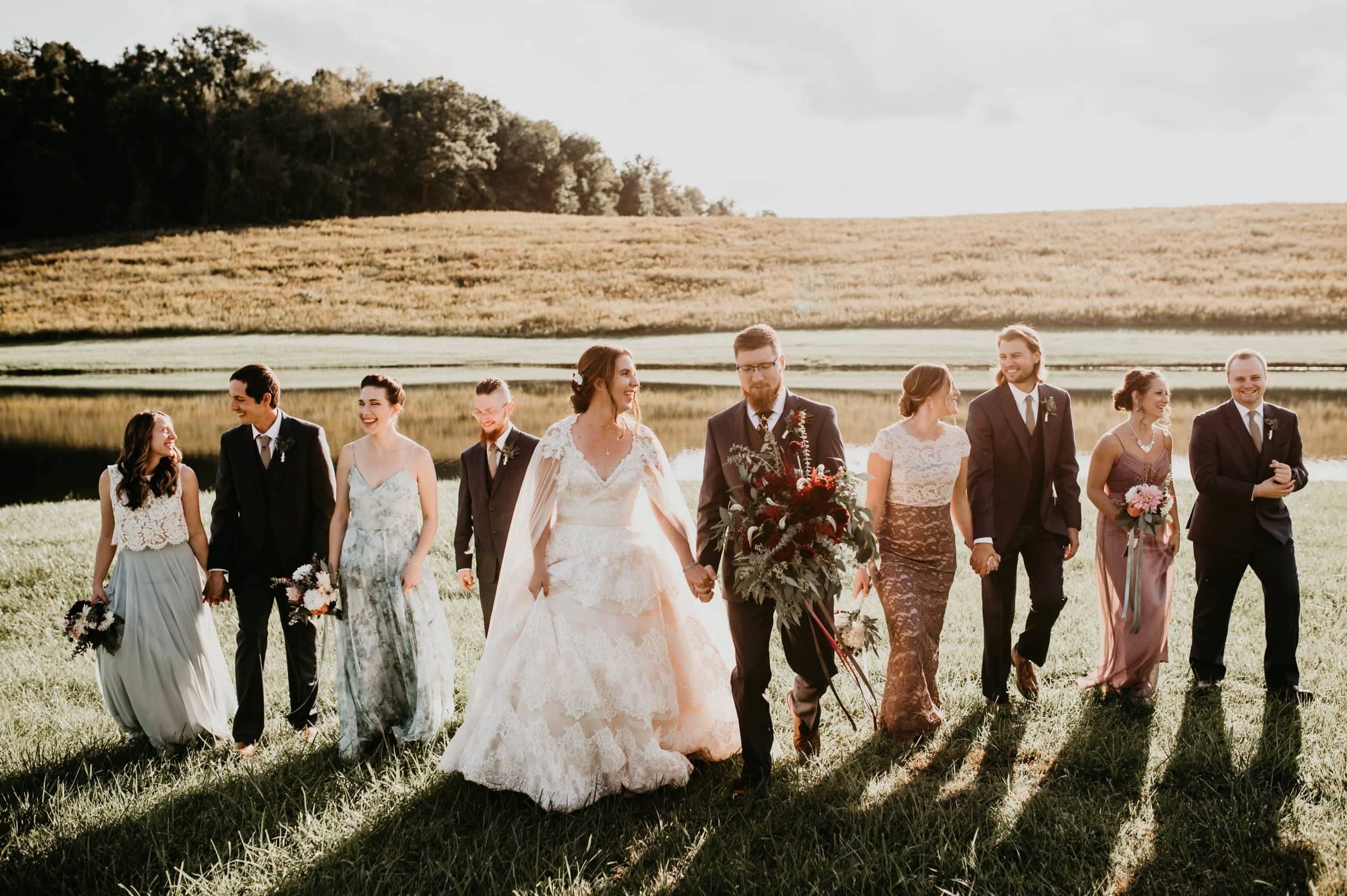 em and tyler bridal party walking.jpg