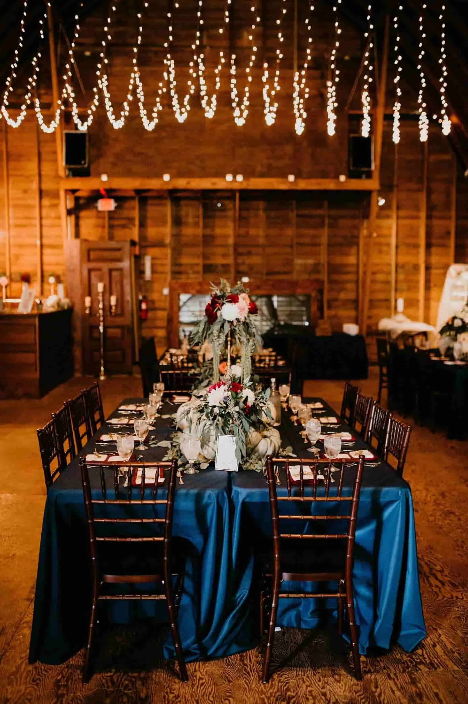 barn wedding table and string lights .jpg
