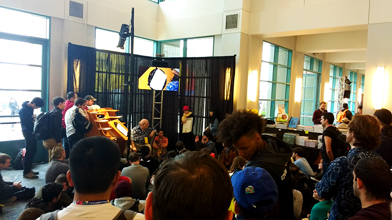 Crowding around Eric Goldberg at the traditional drawing table