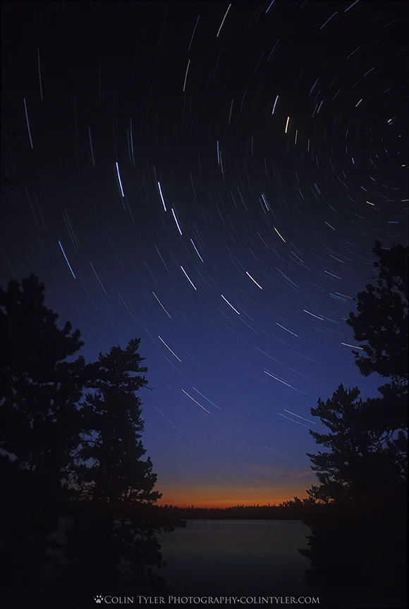 Thirty minute exposure of the sunset sky over Darky Lake, Quetico Provincial Park