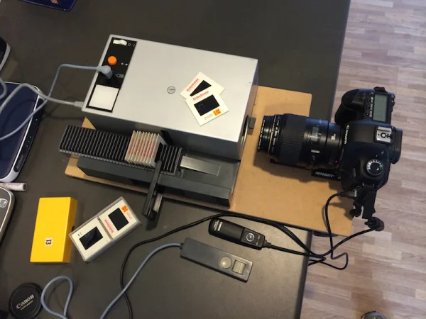 The setup with remotes for operating the projector and camera. A much neater solution.