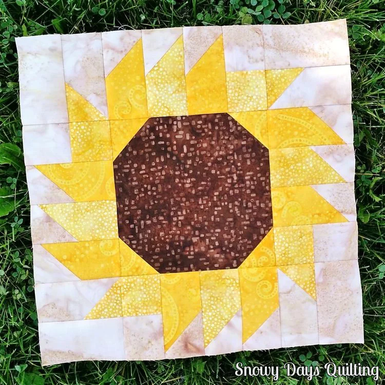 "Sunflower” is a Free Autumn Quilt Block Pattern designed by Bobbi Bridgeman from Snowy Days Quilting!
