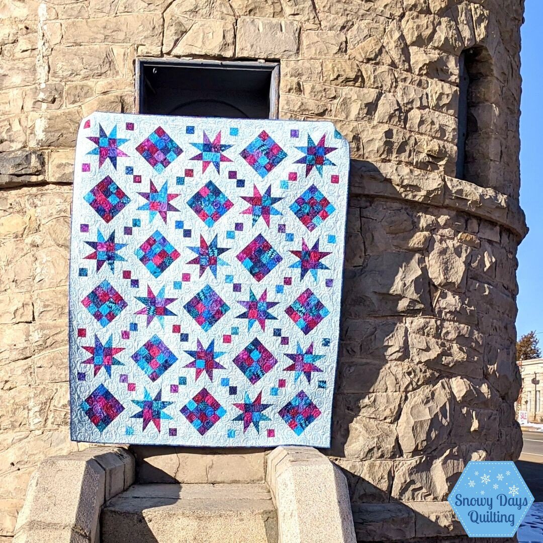 Today we're talking about Coveted Quilts. I once quilted a version of this for a customer, and I fell in love with the pattern. As soon as I saw her quilt, I knew I wanted to make it someday.

When a group of friends decided to make a quilt for my mo