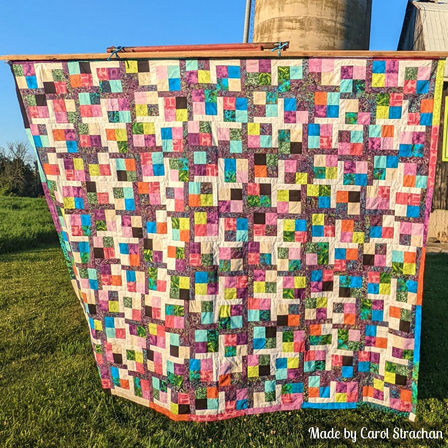easy scrappy fat quarter quilt with sewing print fabrics
