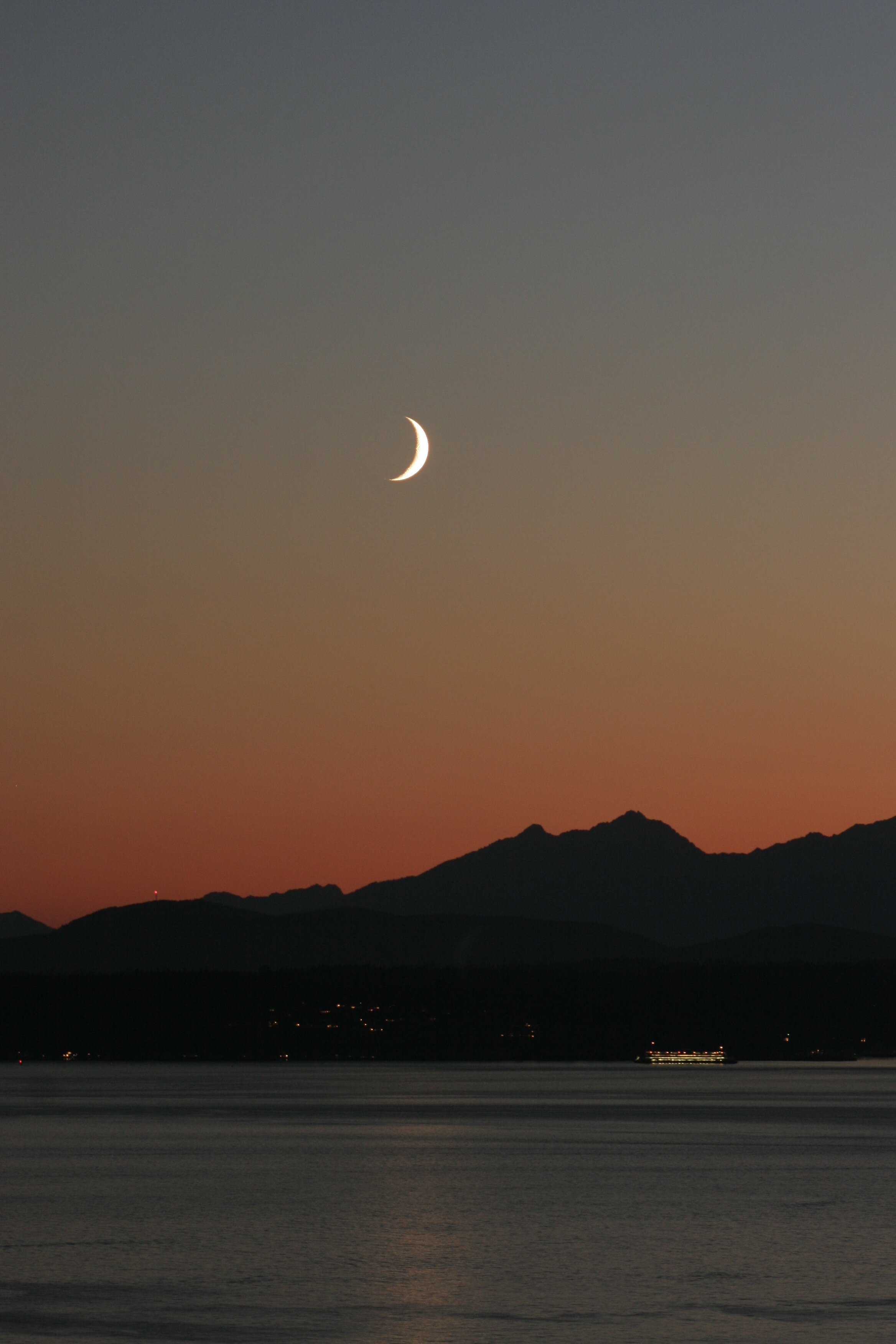 Moon/Sunset over The Olympic Mountains and Puget Sound - Seattle, WA