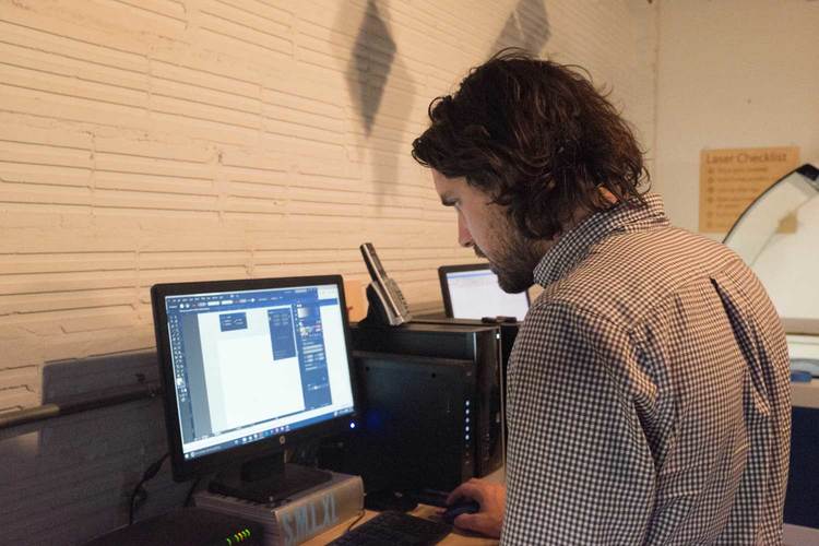 Checking a file at our favorite laser cutting studio, PostStudio, prior to the manufacturing process. 