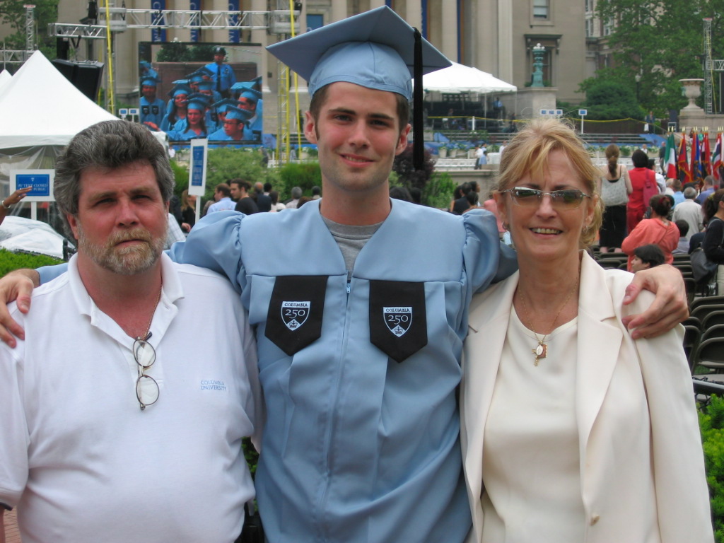  Matt with his parents at Columbia graduation. 