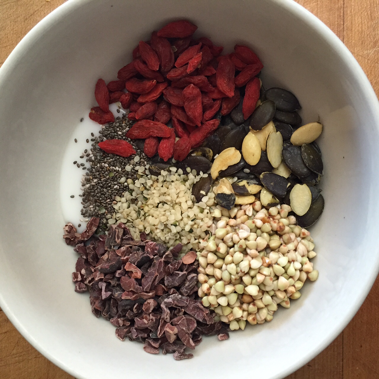 Coconut yogurt, chia seeds, goji berries, pumpkin seeds, soaked buckwheat, cacao nibs, hemp seeds