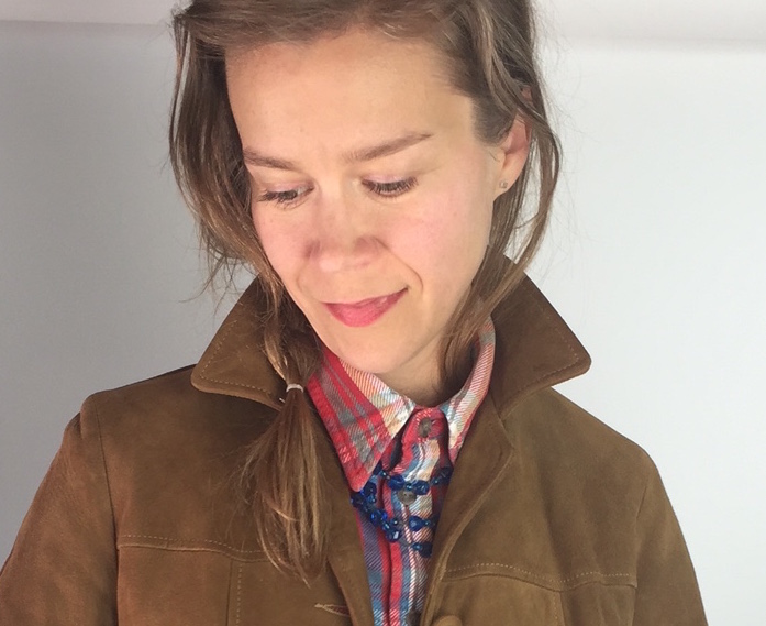 Side braid + necklace over the collar