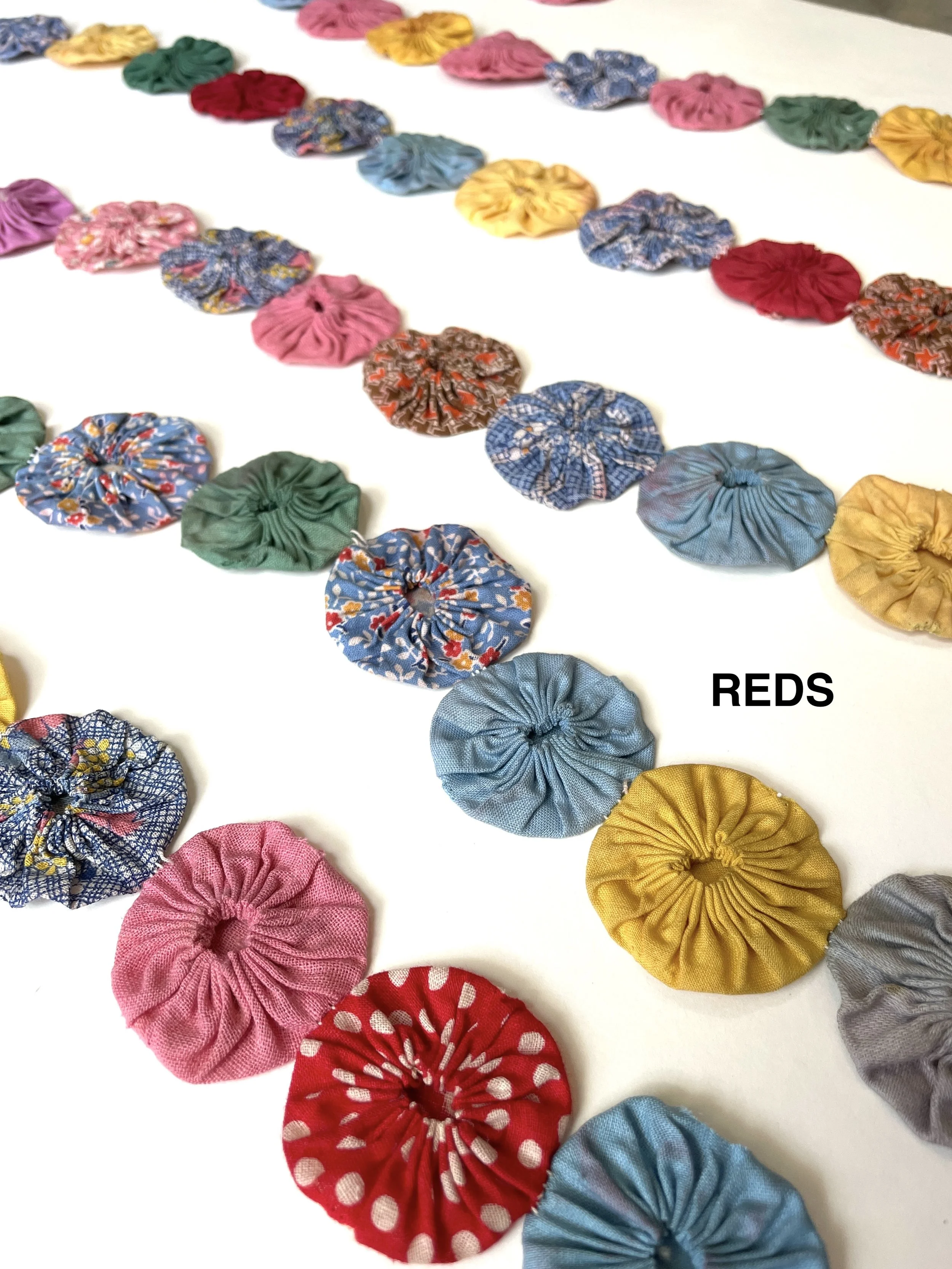 Quilt_garlands_reds_detail.jpg