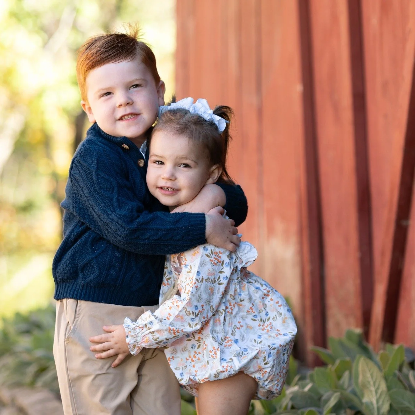 You can't tell me that's not a genuine hug from a big brother.  These fall photos are making for some great family moments!