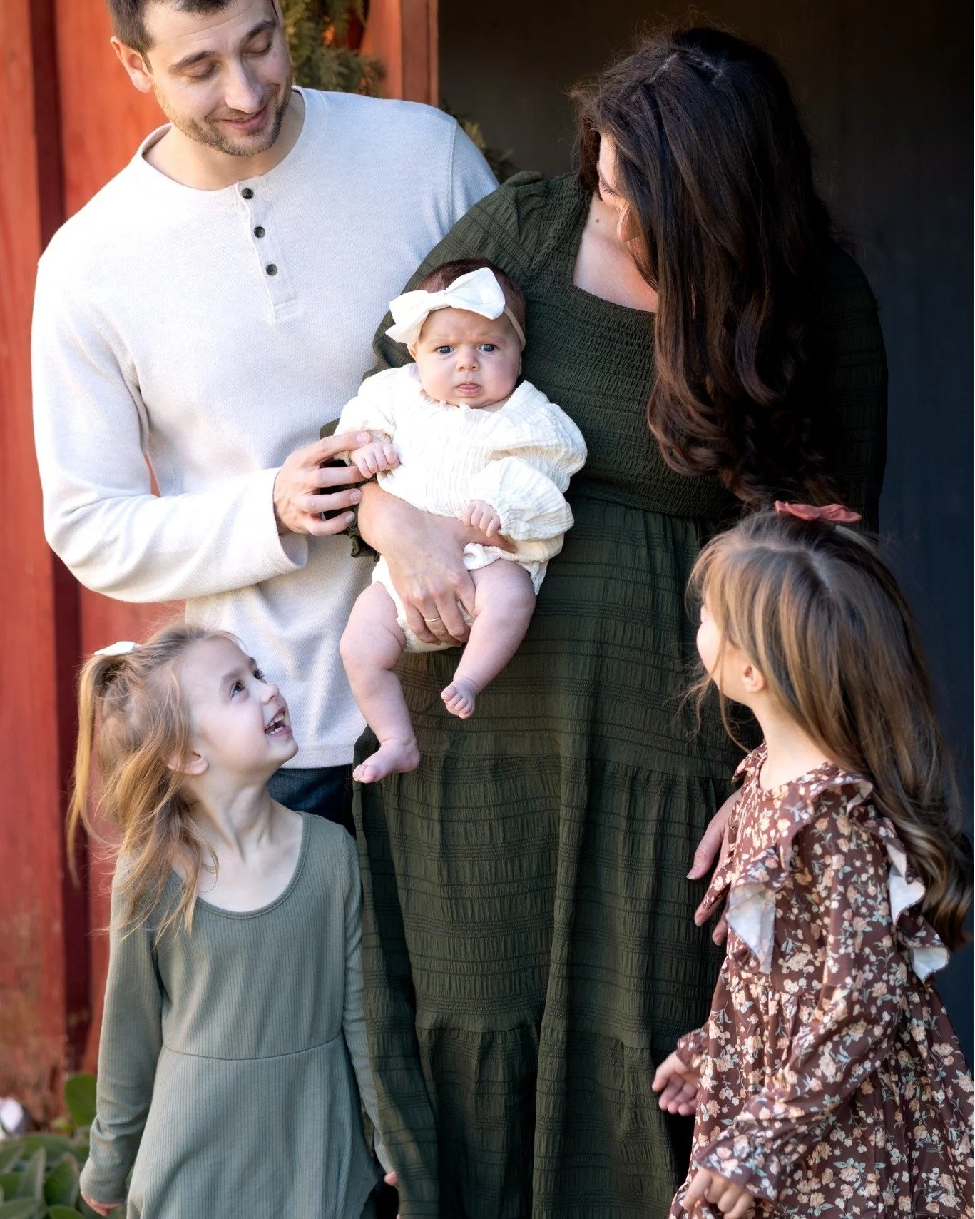 I had the sweetest session with the sweetest family &mdash; and their three girls completely stole my heart. 

Watching the three of them together &mdash; the way the older girls proudly cuddled their baby sister, the way mom and dad looked at their 