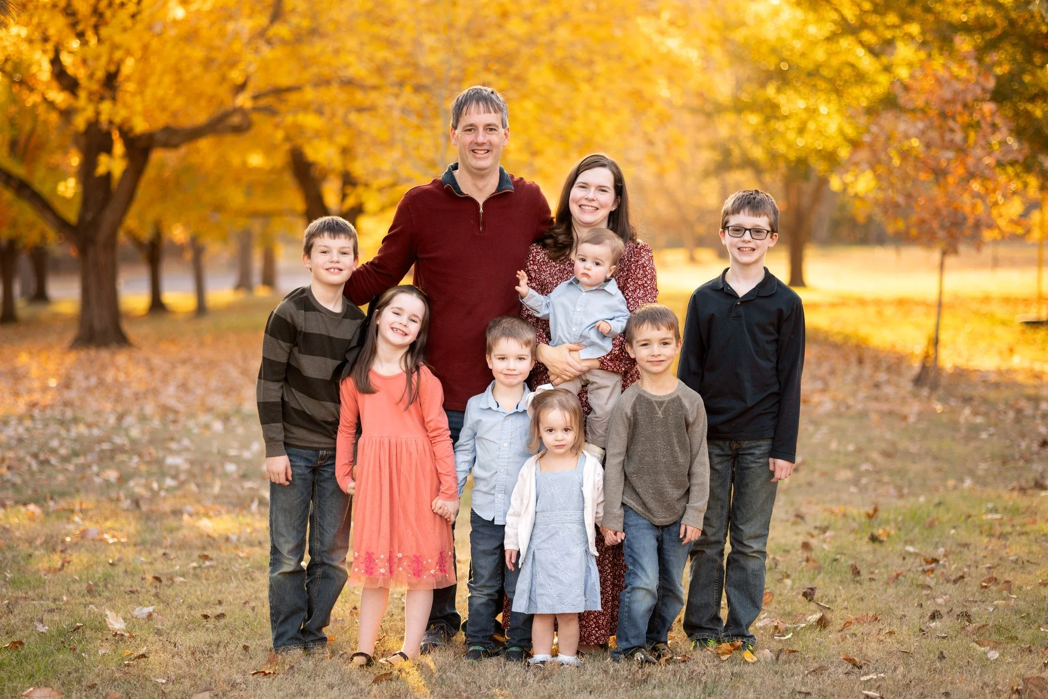Welp, St. Louis, now that all the leaves are officially off the trees, let's get another look at just how beautiful they were this year.  I'm grateful we were finally able to have a FALL family session with this outstanding family...we had been stuck