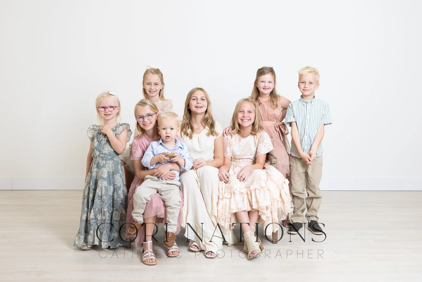 Catholic family studio photography with white background St. Louis, Missouri