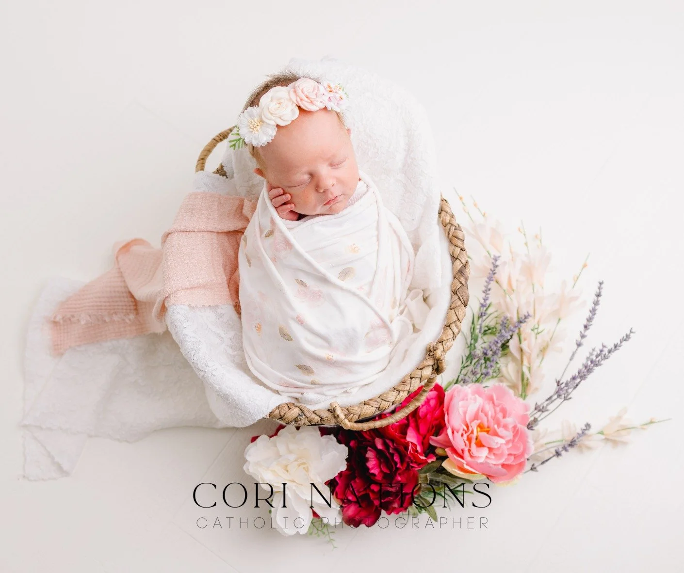 A brand new life, wrapped in the quiet beauty of spring, just days before Easter&mdash;the season of renewal written right into these first moments.

Cori Nations &middot; Catholic Photographer &middot; St. Louis, Missouri
corinations.com