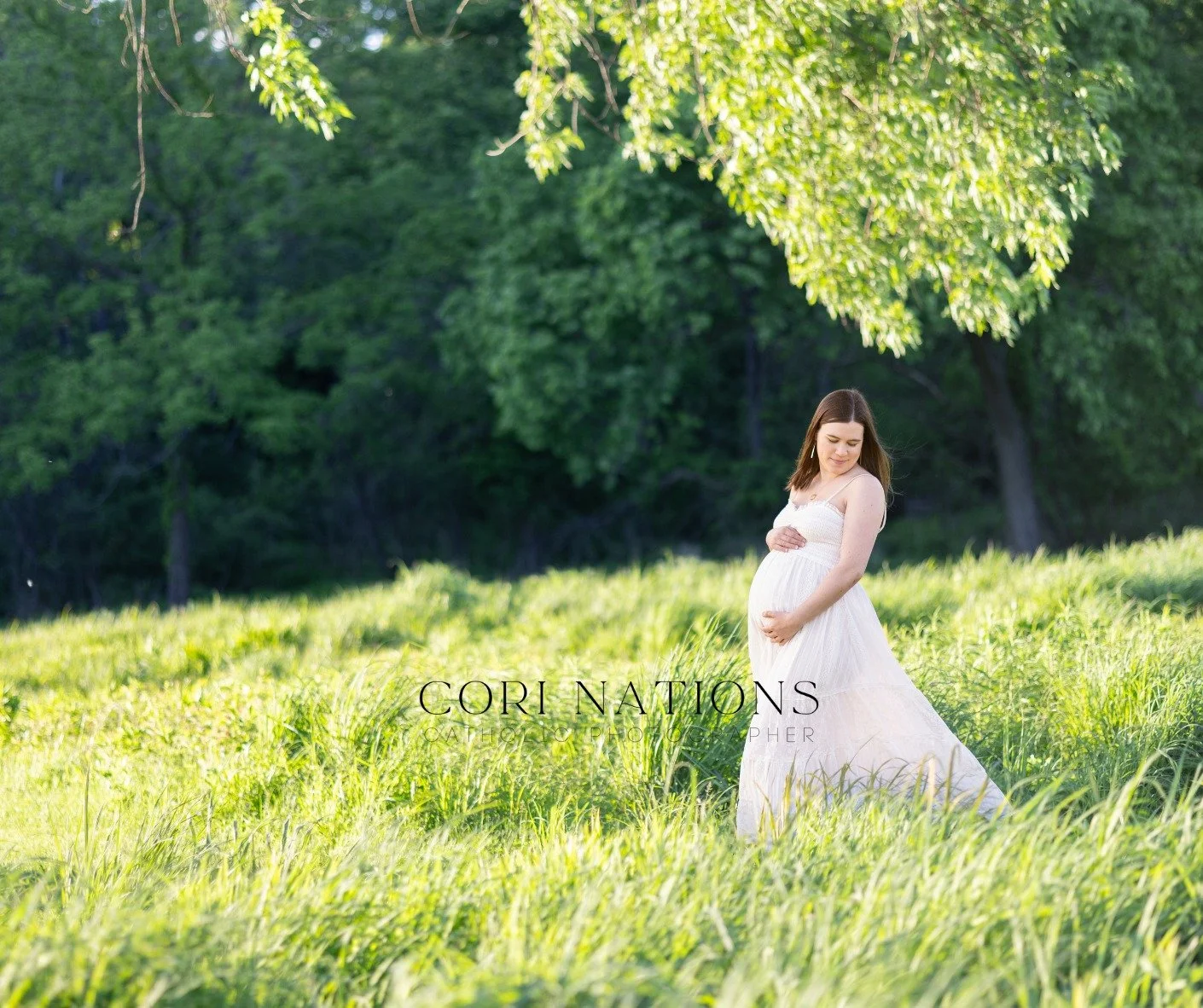 Spring's vibrant greens provided the perfect backdrop for this maternity session. The beauty of the landscape paired with the quiet connection between these two created images that feel both timeless and full of life. 💚📷

#stlcatholicphotographer #