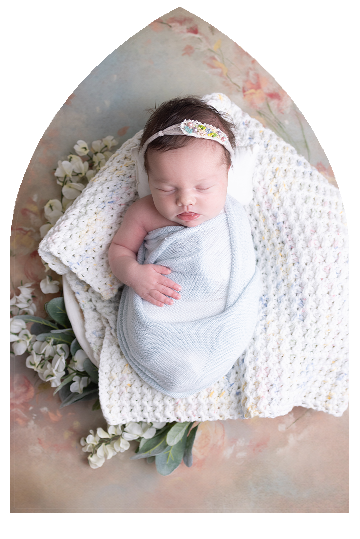 St. Louis Catholic Newborn girl in light blue