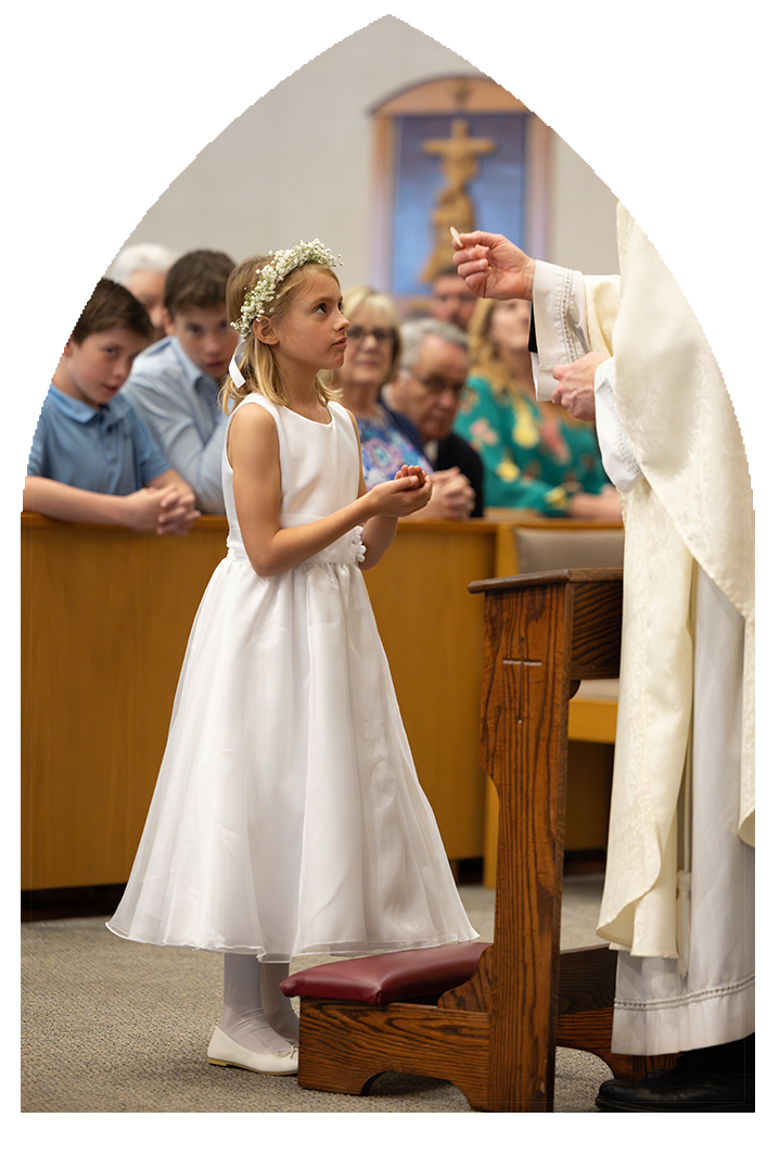 Girl receiving her first communion