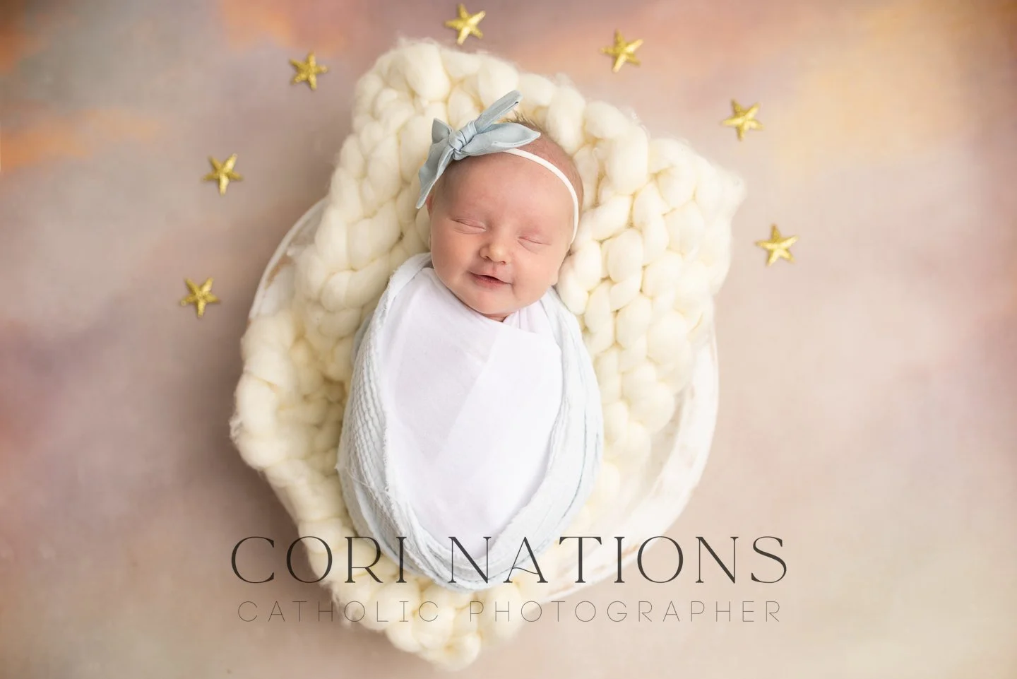 Catholic Newborn photo of baby with star background