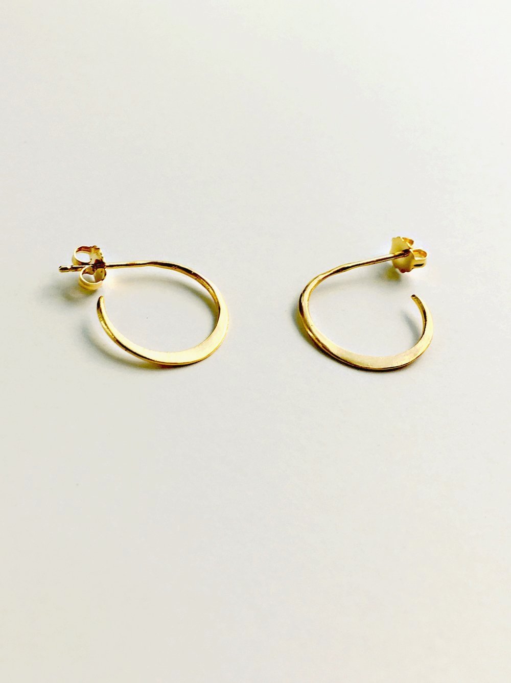 flat-hammered-moon-stud-hoops.jpg