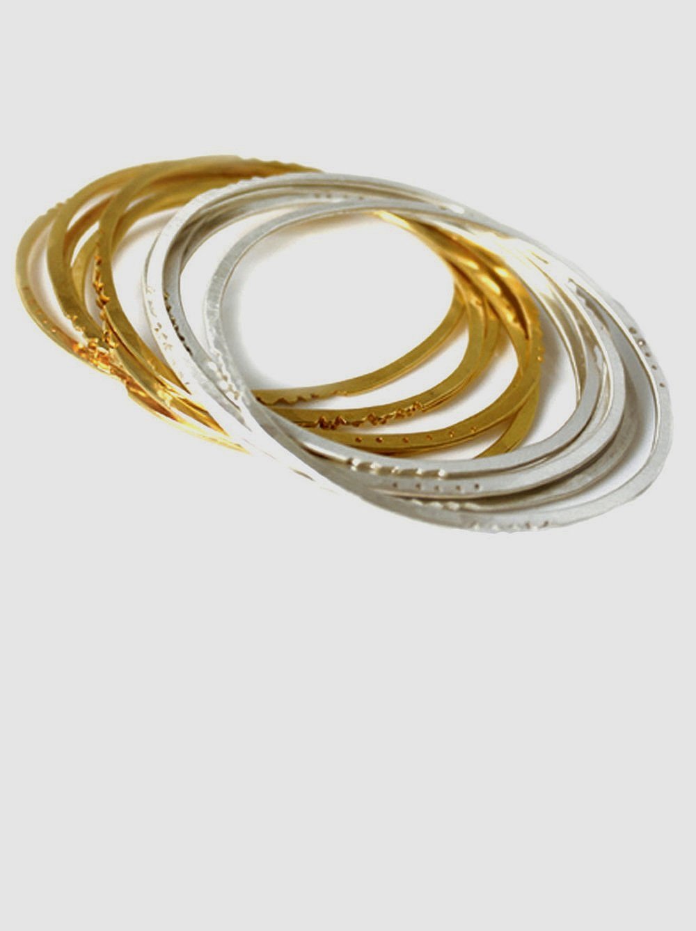 flat-oval-hammered-stacking-bracelets.jpg