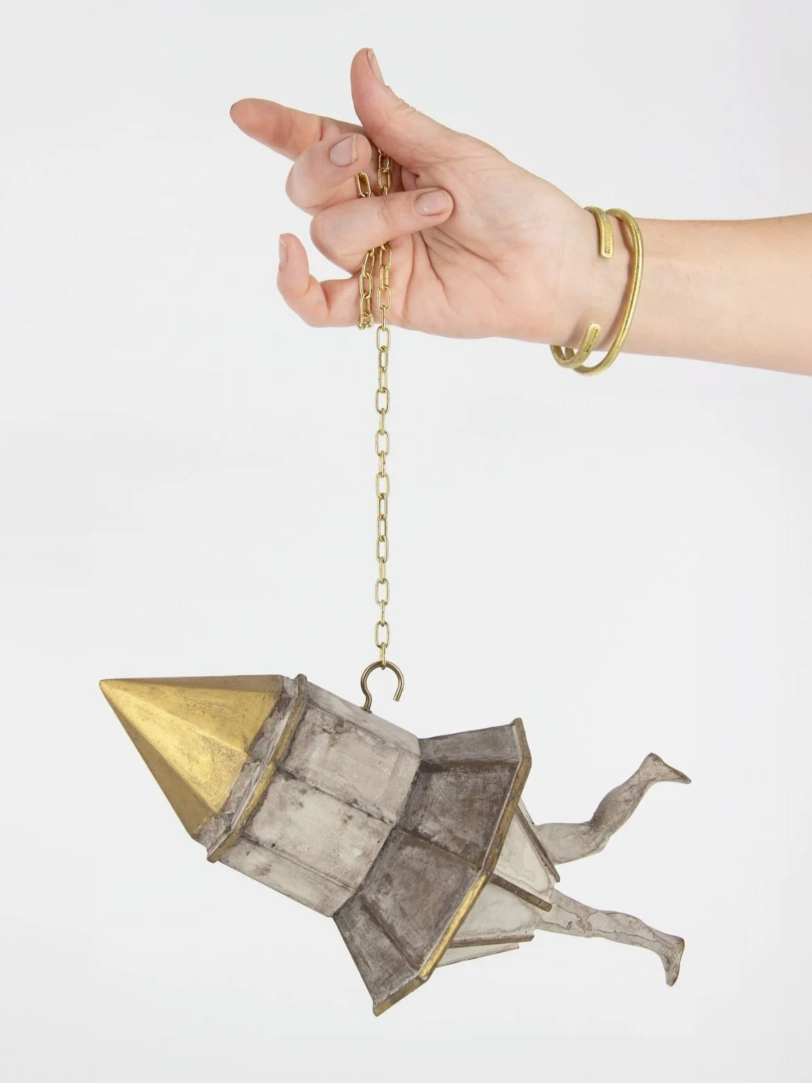 There are some tiny rockets and &ldquo;floating home&rdquo; editions now available in the @sccpgh store! Hand modeling by @annieheisey 💅🏽 
.
.
.
.
.
.
.
.
.
#woodsculpture #miniature #modelbuilding #pittsburghart #collageart #rocketship #dreamhome 