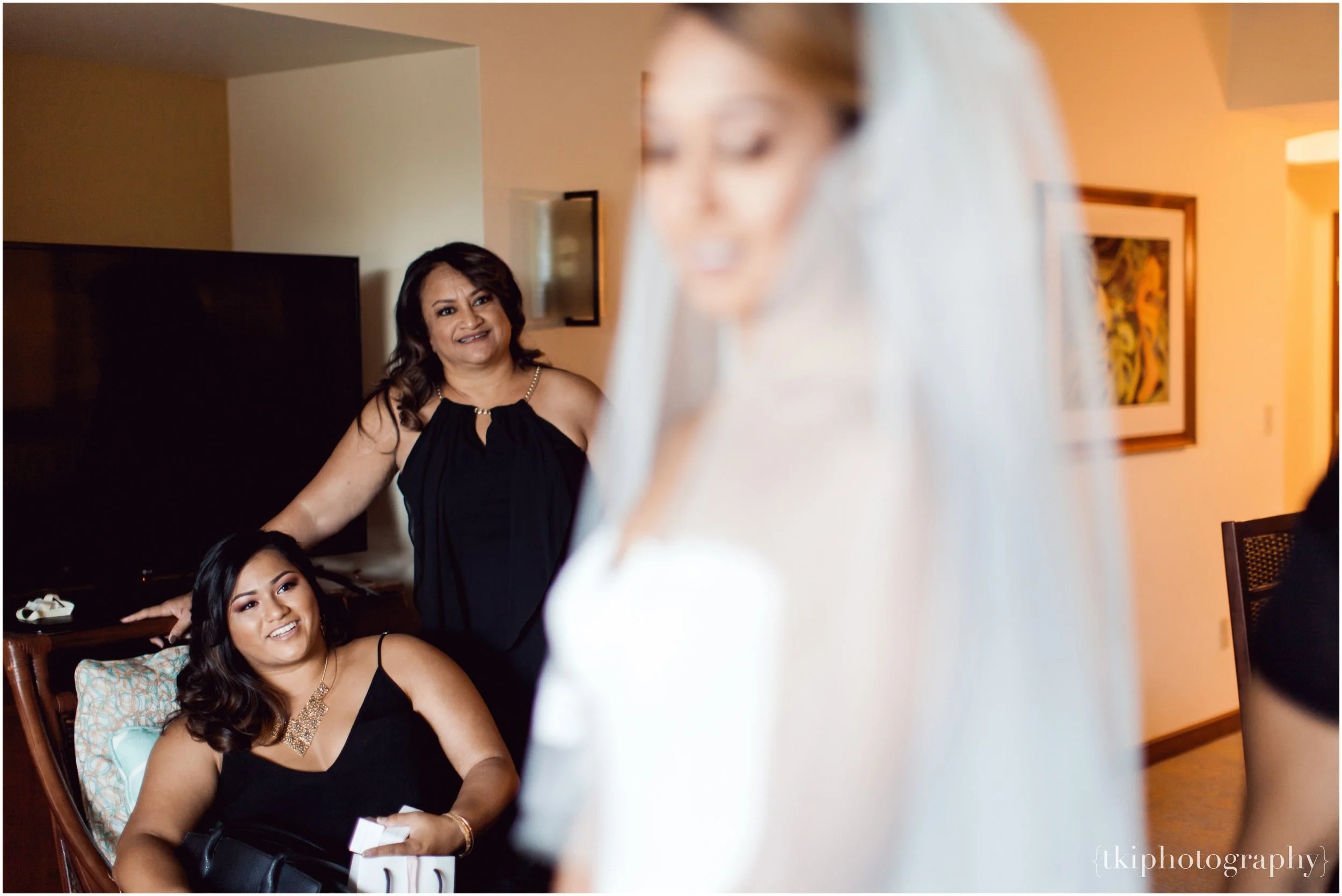 Bridesmaids watching the bride