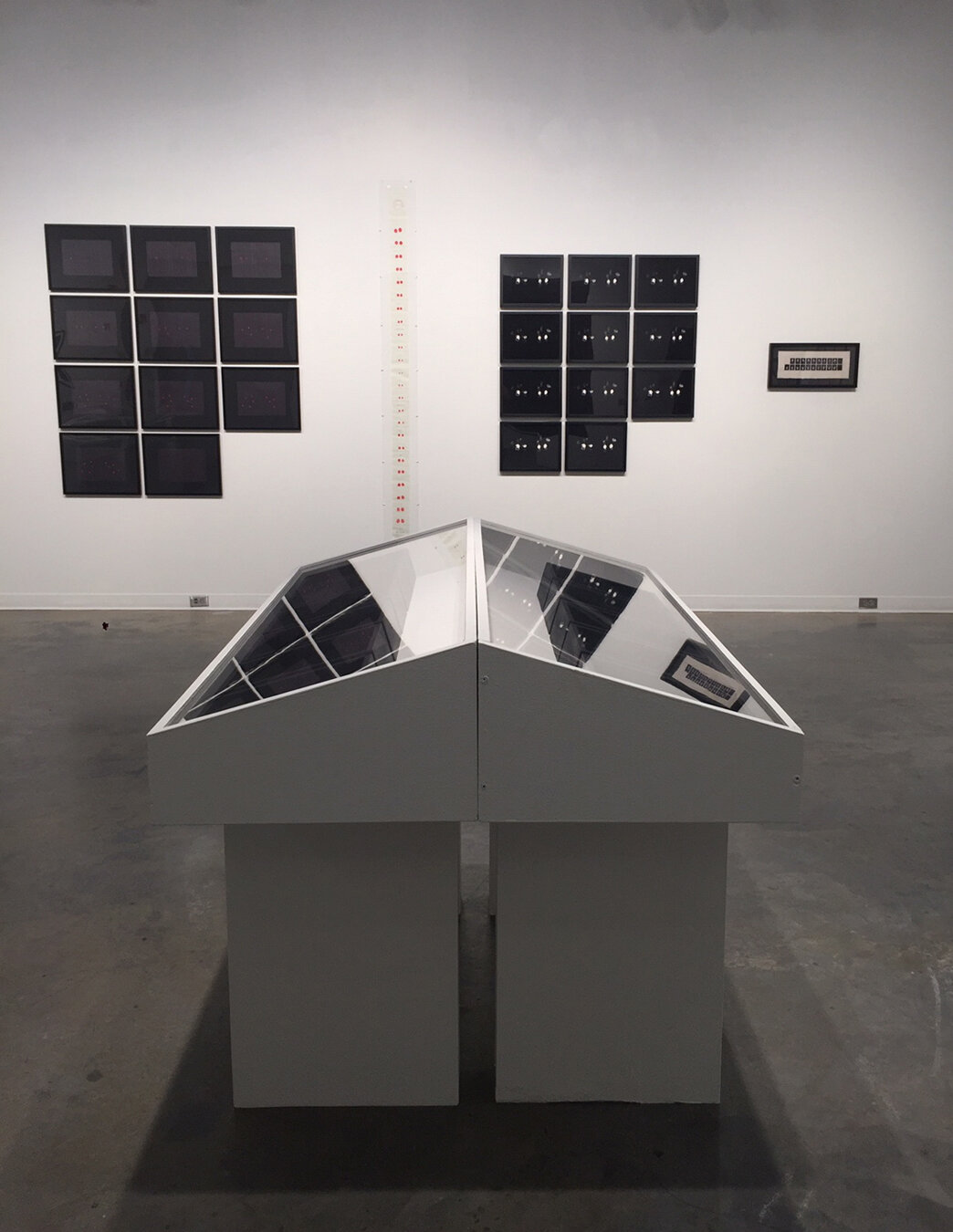   November: Improbability Game  Eleven Dice Boxes and Forty-five Gemini Dice 4” x 9” x 12” each box (installed dimensions variable) 2018 