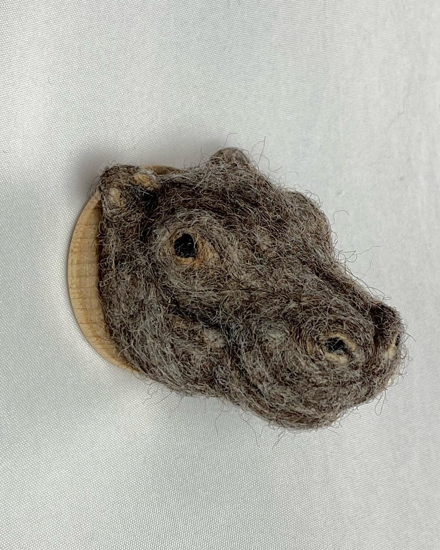 A teeny hippo head for the auction at Music in the Woods, a very fun event benefiting @imagoearth .
The wooden disk, on which the head is mounted, measures 1.75 inches, and the snoot comes out two inches. It&rsquo;s really small!
.
#feltedwool #felte