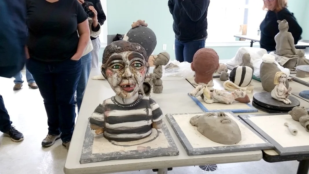 Clay sculptures = student works.