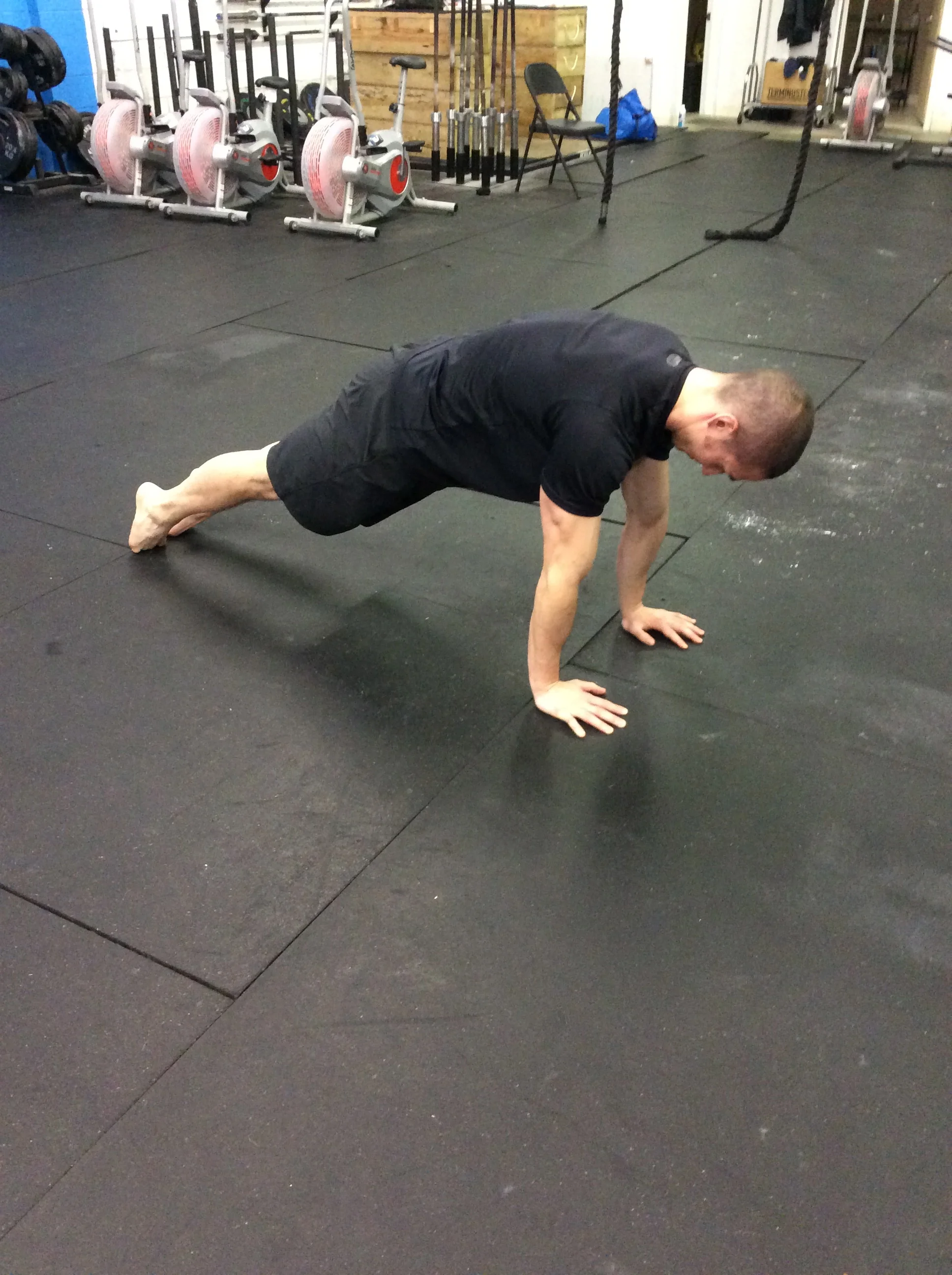 Am I holding a plank or stopping at the top of a push-up? 